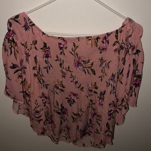 a floral off the shoulder pink blouse